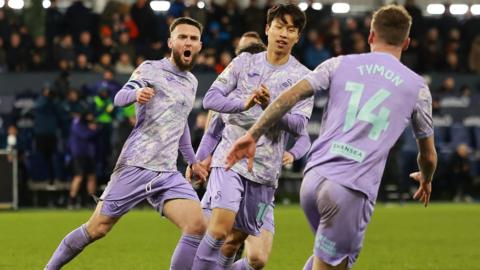 Matt Grimes celebrates equaliser