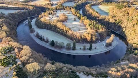 A view over the River Tweed, with the Eildons in the distance, and just showing the Leaderfoot Viaduct