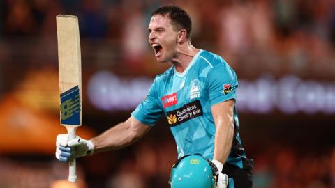 Brisbane Heat all-rounder Jack Wildermuth roars in celebration after victory over Perth Scorchers