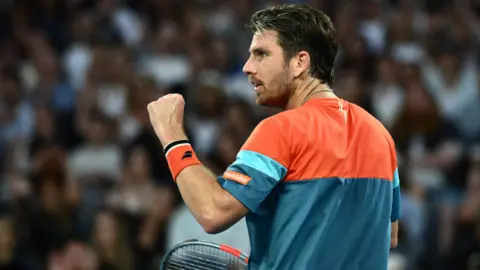 Cameron Norrie celebrates