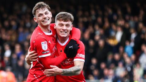 Owen Lunt celebrates scoring his first goal for Crewe