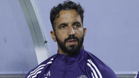 Ruben Amorim watches on during a Manchester United pre-season match