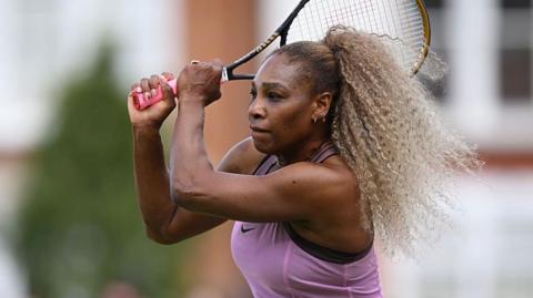 Serena Williams hits the ball at Queen's