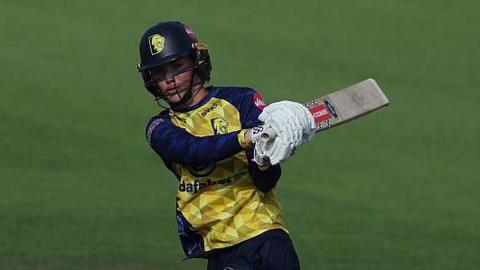 Grace Thompson hits a boundary