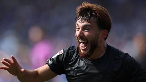Ilias Chair celebrates scoring his second goal for QPR