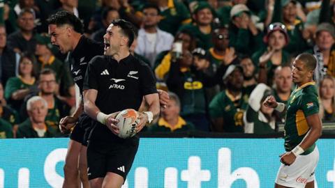 Will Jordan celebrates his second try