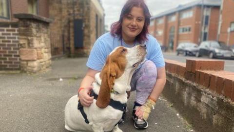 Kay Goulden with her basset hound therapy dog Hudson