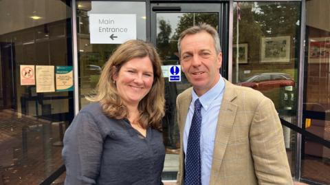 Rob and Emma Sturdy, the tenants of Eden Farm in Old Malton, standing outside Ryedale House in Old Malton, where a public inquiry is being held into plans to build a solar farm on large parts of their land.