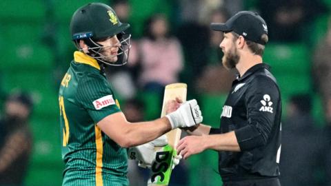 South Africa's David Miller and New Zealand's Kane Williamson shake hands in a Champions Trophy match earlier in 2025