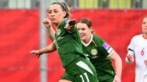 Katie McCabe celebrates scoring 