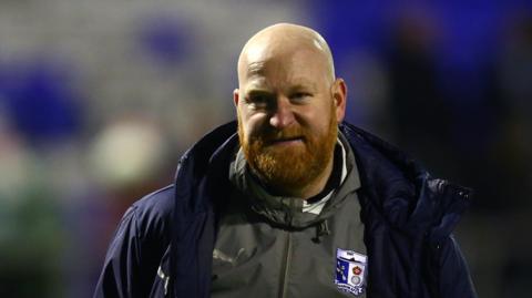 Barrow boss Andy Whing at the end of the game against Doncaster last month