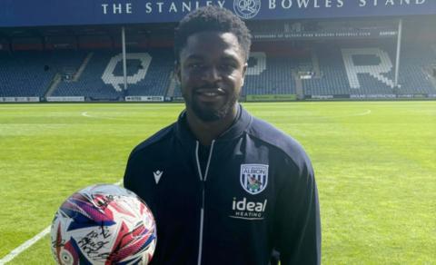 Josh Maja with the hat-trick ball at Loftus Road 