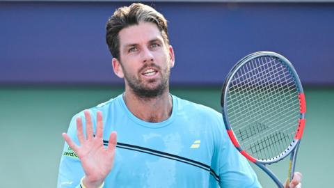 Cameron Norrie waves to the crowd after beating Alex de Minaur at the Canadian Open