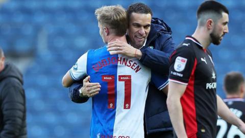 Valerien Ismael hugs Andri Gudjohnsen after Blackburn's win over Southampton