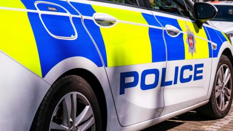 A close up stock image of a police car