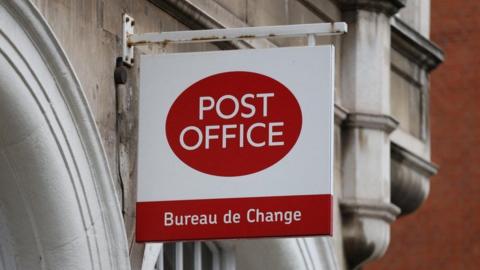 Close up of a Post Office sign