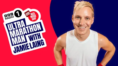 Jamie Laing poses in a running top 
