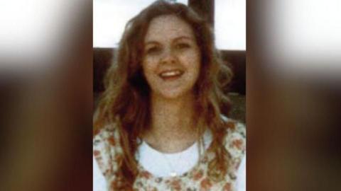 Fiona Pender, a young woman with long, curly blonde hair, smiling