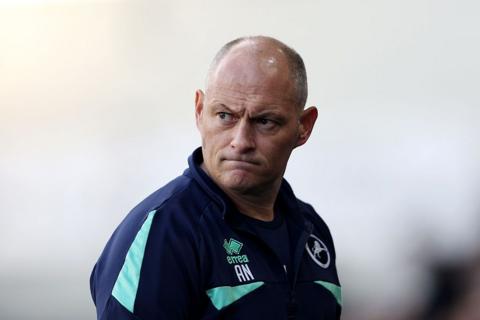 Alex Neil looking on from the touchline.