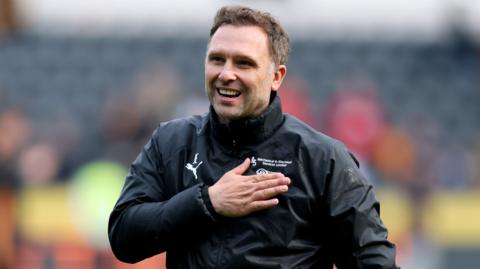 Derby boss John Eustace celebrates after the 1-0 win at Hull