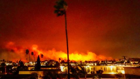 Flames burn in California