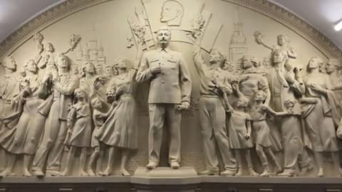 the statue of Joseph Stalin carved in white stone in Moscow
