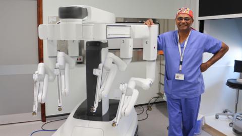 Consultant uro-oncologist and surgeon Raj Singh with the surgical "robot"