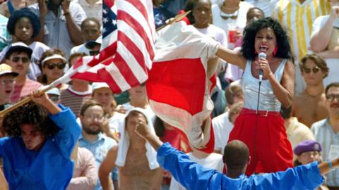 Diana Ross sings to the crowd gathered inside Chicago's Soldier Field stadium on June 17, 1994 during the opening ceremony for the World Cup