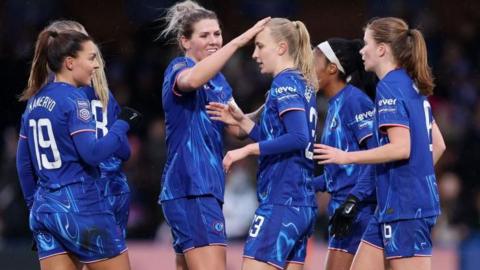 Chelsea celebrate scoring against Brighton