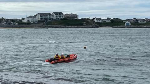 RNLI boat and crew put to sea