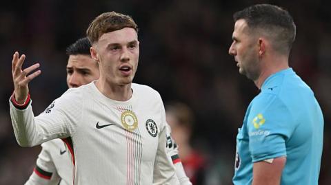 Cole Palmer complaining to the referee during a match against Bournemouth