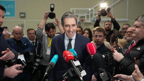 Taoiseach and Fine Gael leader Simon Harris speaks to the media as he arrives at the election count centre at Shoreline Leisure Greystones