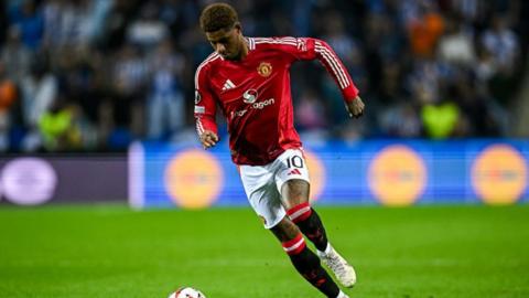 Marcus Rashford playing for Manchester United