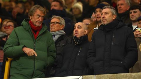 Manchester United co-owner Sir Jim Ratcliffe (L) chief executive Omar Berrada (C) and director of football Jason WIlcox (R)