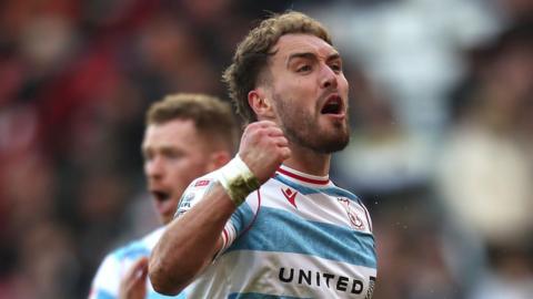 Wrexham striker Sam Smith celebrates