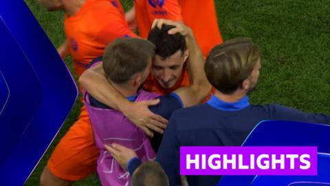 Celje players hug after full-time