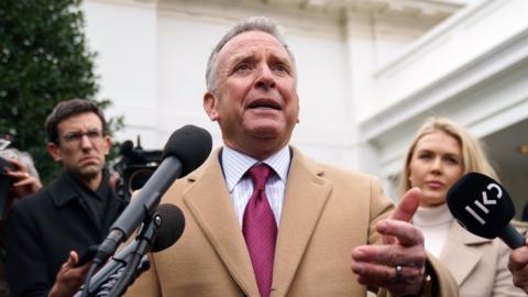 A man, US Middle East envoy Steve Whitkoff, speaks to reporters.