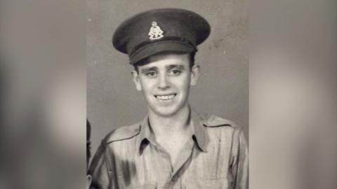 A young man in a British World War Two uniform