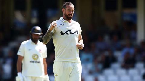Jordan Clark celebrates taking a wicket against Sussex