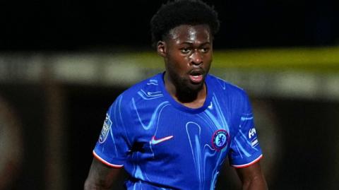 Alex Matos in action, wearing a blue Chelsea shirt