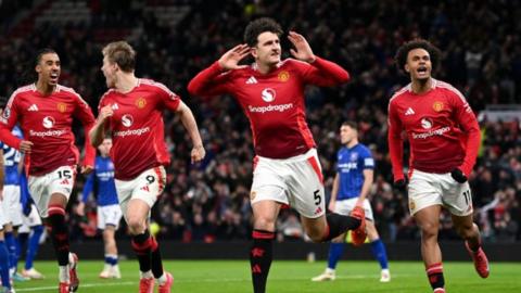 Manchester United defender Harry Maguire celebrates his winner against Ipswich at Old Trafford