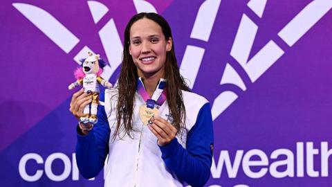 Scotland's Angharad Evans with her swimming gold medal