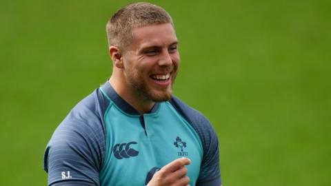 Sean Jansen smiles during Ireland training