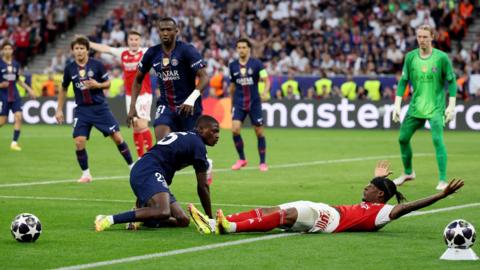 Madueke on floor claiming penalty