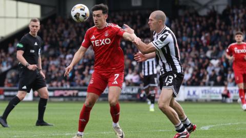Aberdeen's Jamie McGrath and St Mirren's Alex Gogic in action during the match between St Mirren and Aberdeen