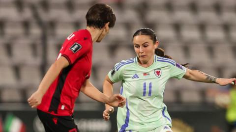 Hannah Cain attacks for Wales