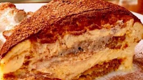 Tiramisu with its distinctive yellow and brown colour 