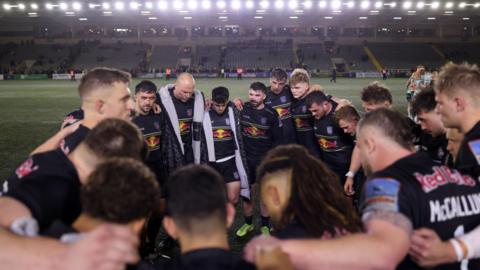 Newcastle Red Bulls players huddled together after losing at home to Leicester Tigers in Prem Rugby Cup 