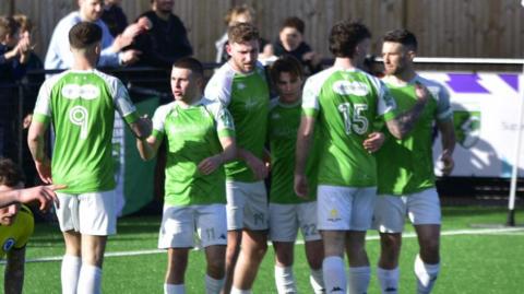 Guernsey FC celebrate scoring their third goal