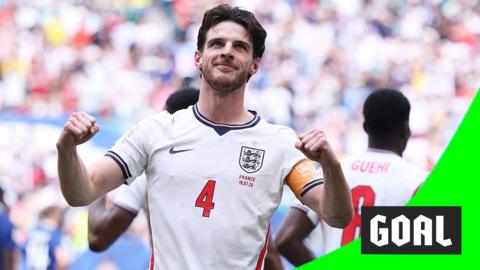 Declan Rice fist-bumps the air to celebrate scoring the first goal for England against France in the 2026 World Cup.